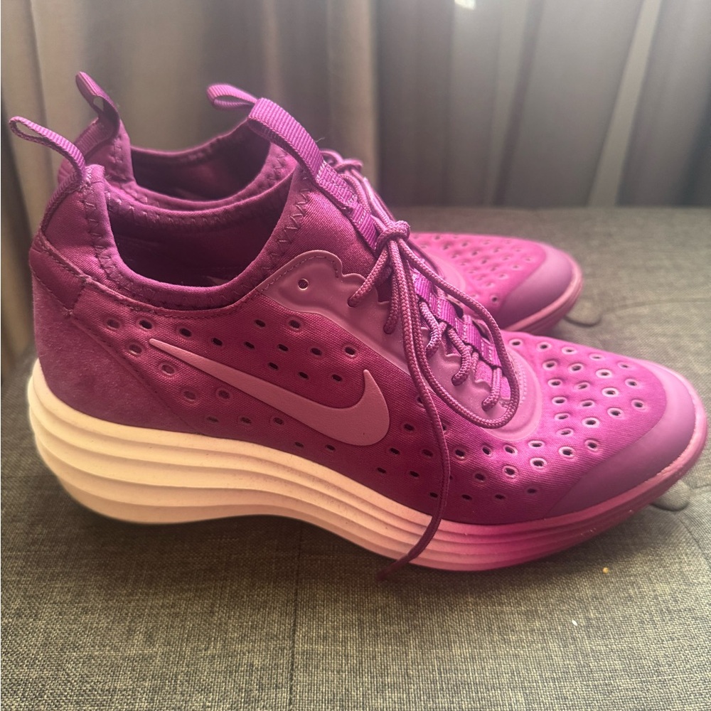 Nike Purple Sneakers with Knit Texture and Streamlined Design